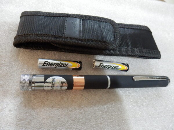 A black bag two batteries and a EMF protection pen